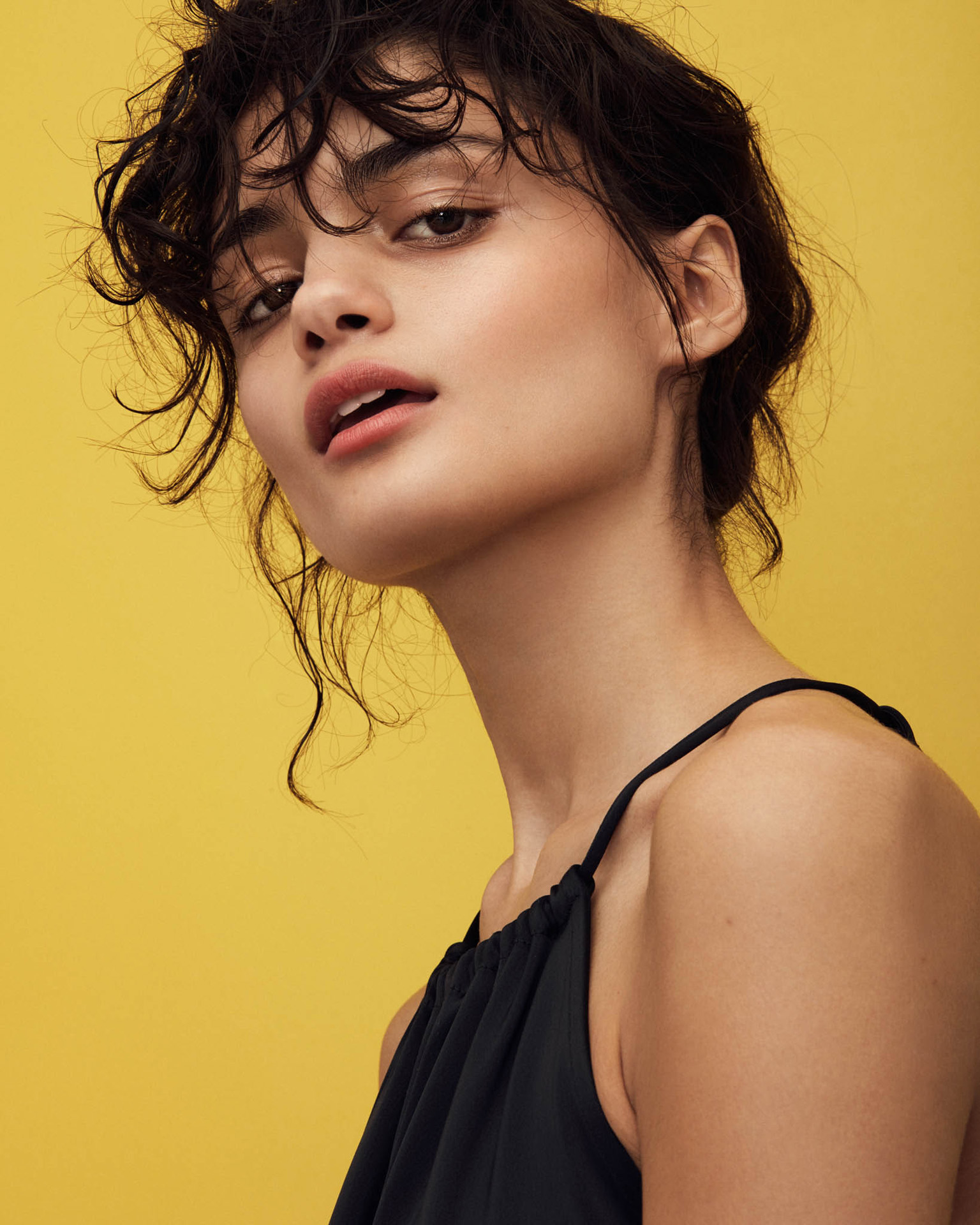 woman face on yellow background by Maxyme G Delisle for The Ones 2 Watch