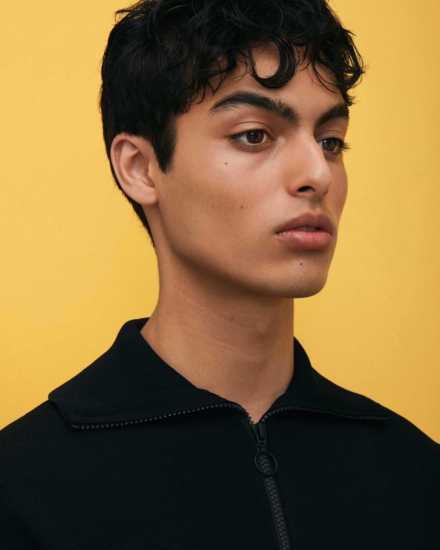 latino man face on yellow background by Maxyme G Delisle for The Ones 2 Watch