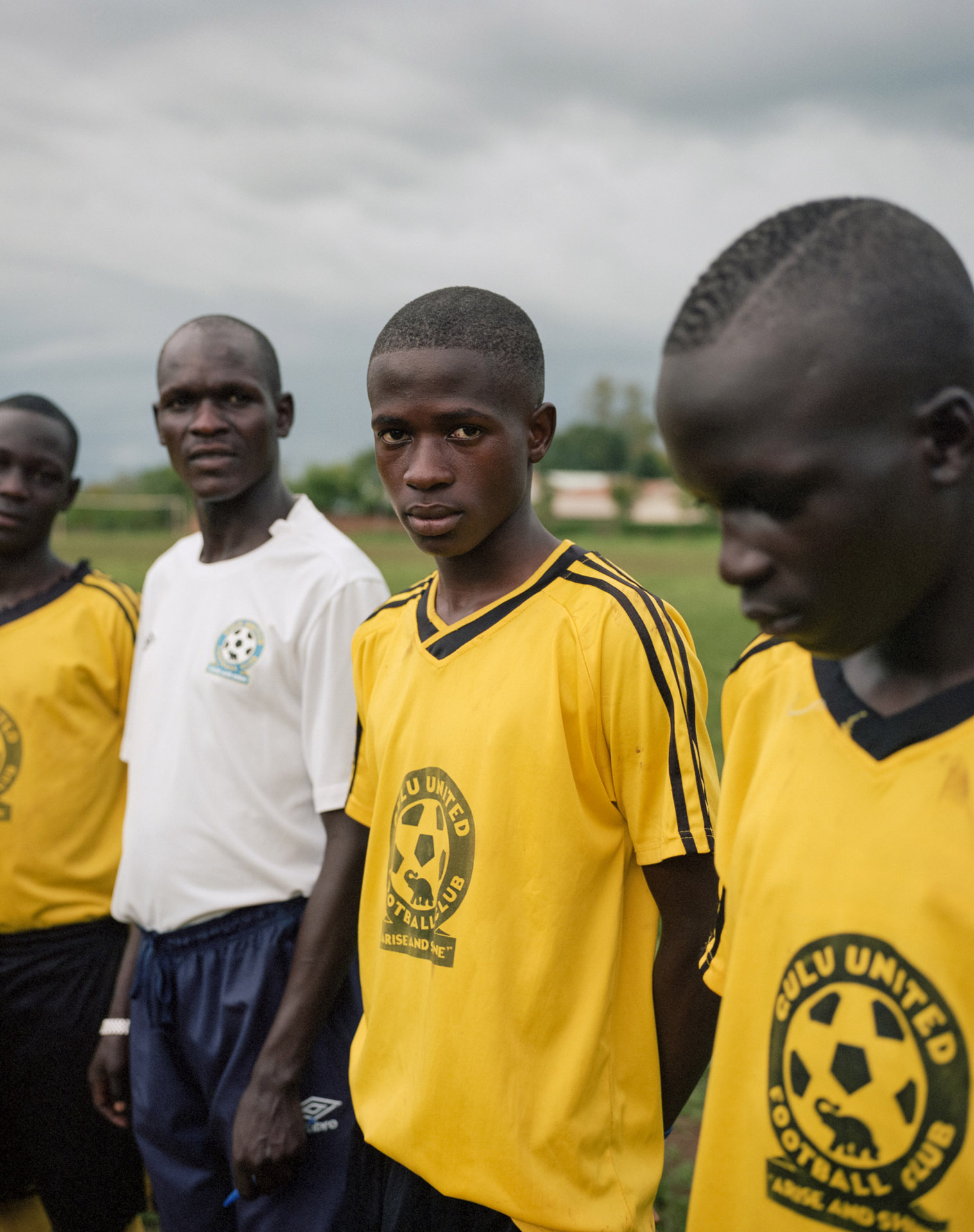 young black boys playing soccer for United Football Club by Alexi Hobbs in Uganda for Football for Good with Sportsnet