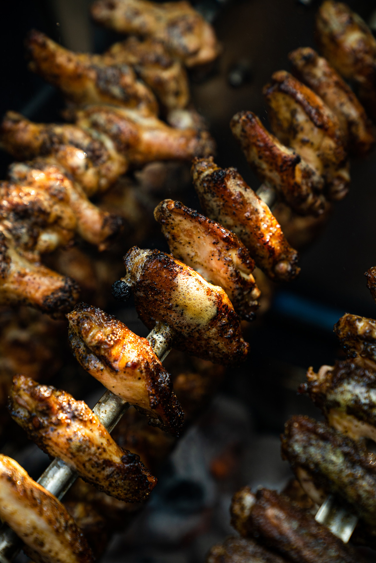 close up of chef Ted Reader cooked chicken wings skewers by Bruno Florin for Van Houtte 100th anniversary