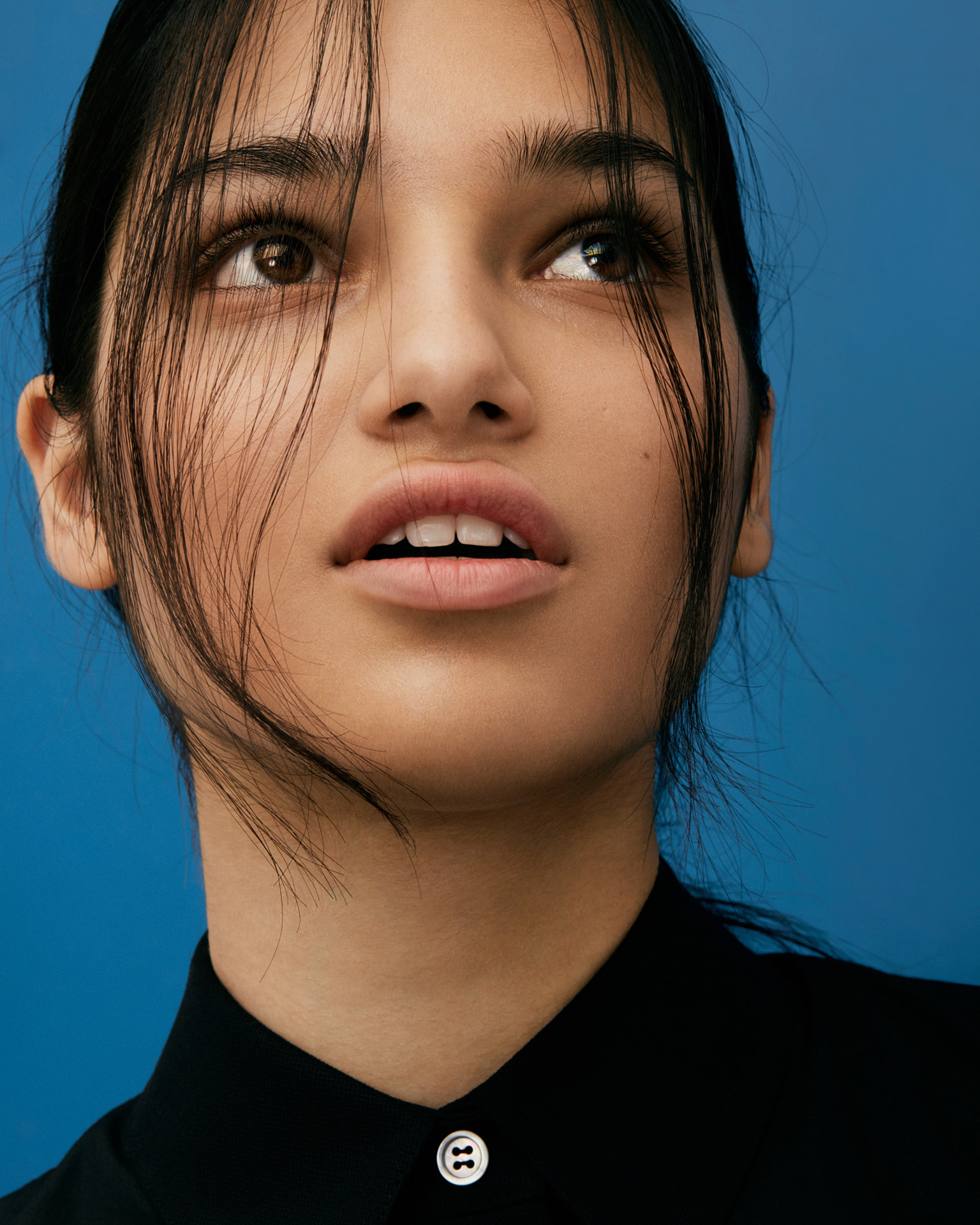 woman face on blue background for Maxyme G Delisle for The Ones 2 Watch