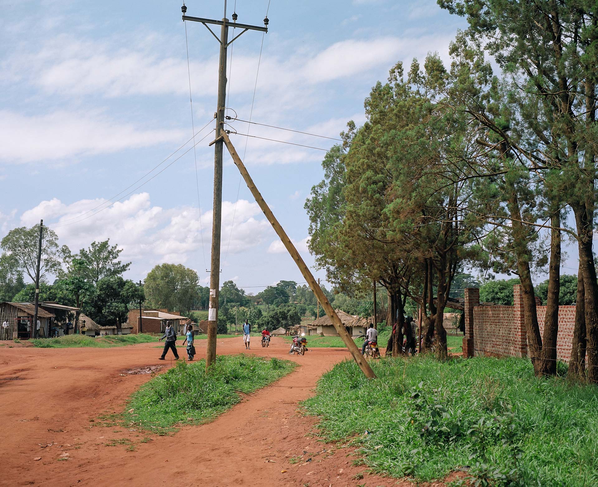 dirt roads in village by Alexi Hobbs in Uganda for Football for Good with Sportsnet