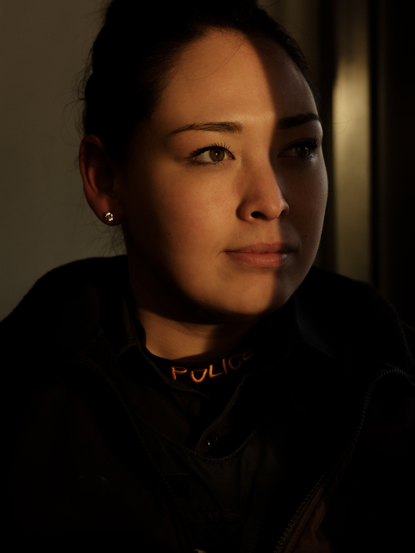 portrait of constable Pamela Stevenson, the only female Inuk police officer on the Kativik Regional Police Force in Nunavik by Alexi Hobbs for Air Inuit