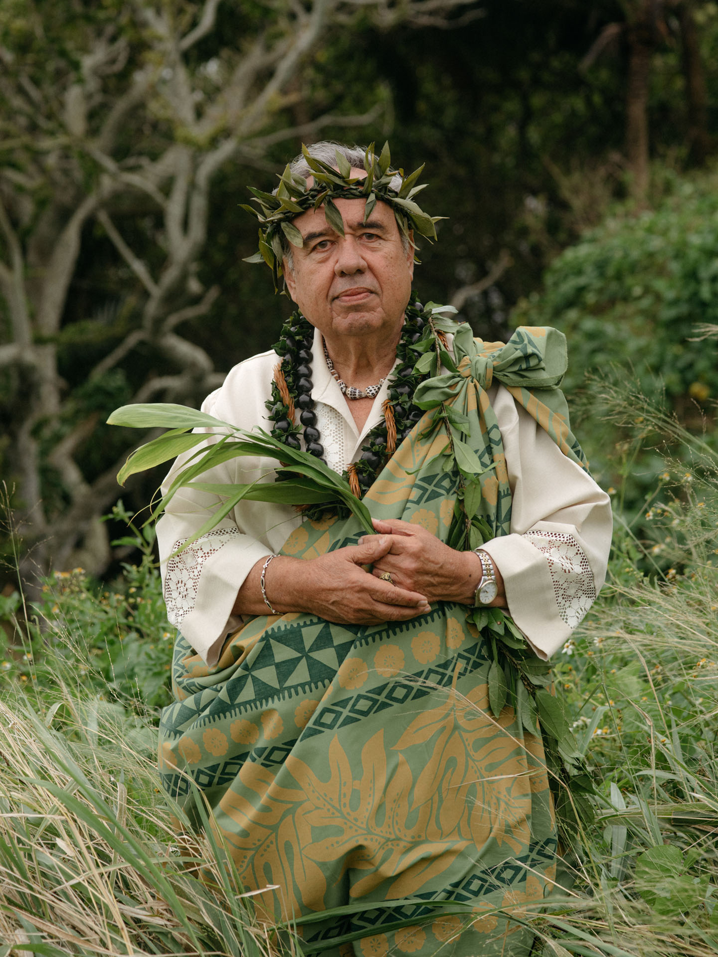 traditional native hawaiian priest in middle of a jungle by Alexi Hobbs in Hawai'i for enRoute Magazine