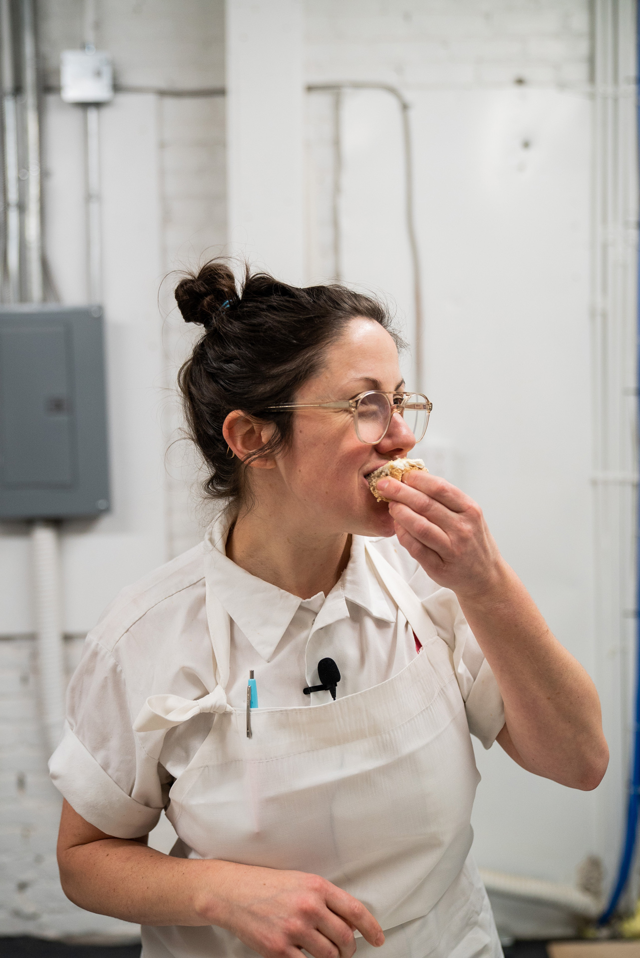portrait of chef Stephanie Labelle from pastry shop Rhubarbe eating cake by Bruno Florin