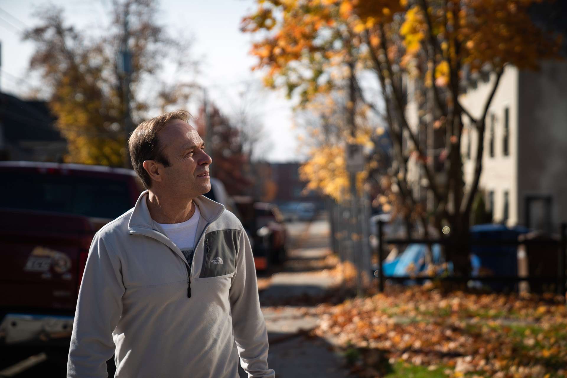man walking in the street in autumn by Bruno Florin for BDC Beyond Business with Cossette