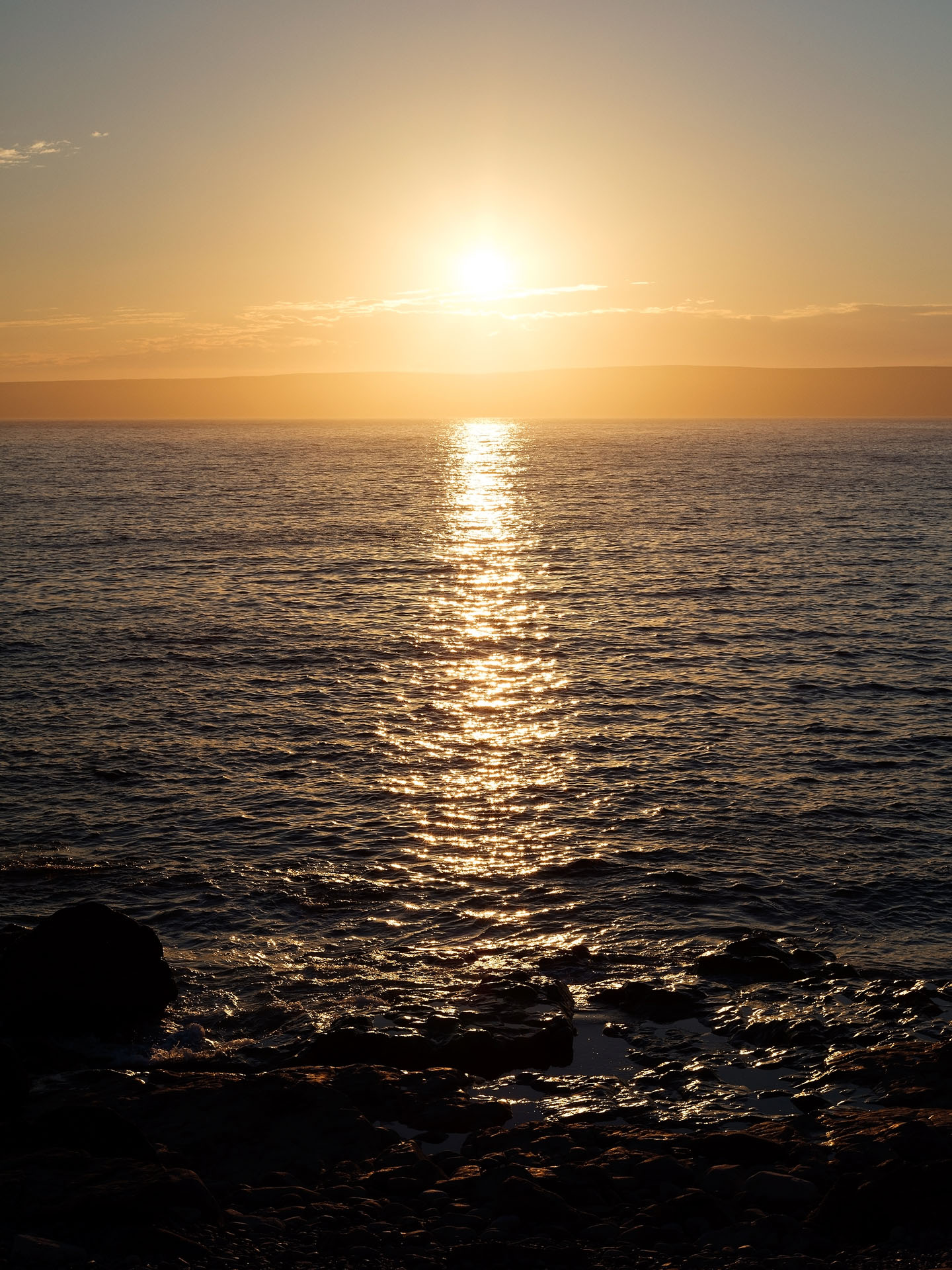 sunrise over the sea by Guillaume Simoneau in Saint-Pierre-et-Miquelon for M le mag Le Monde