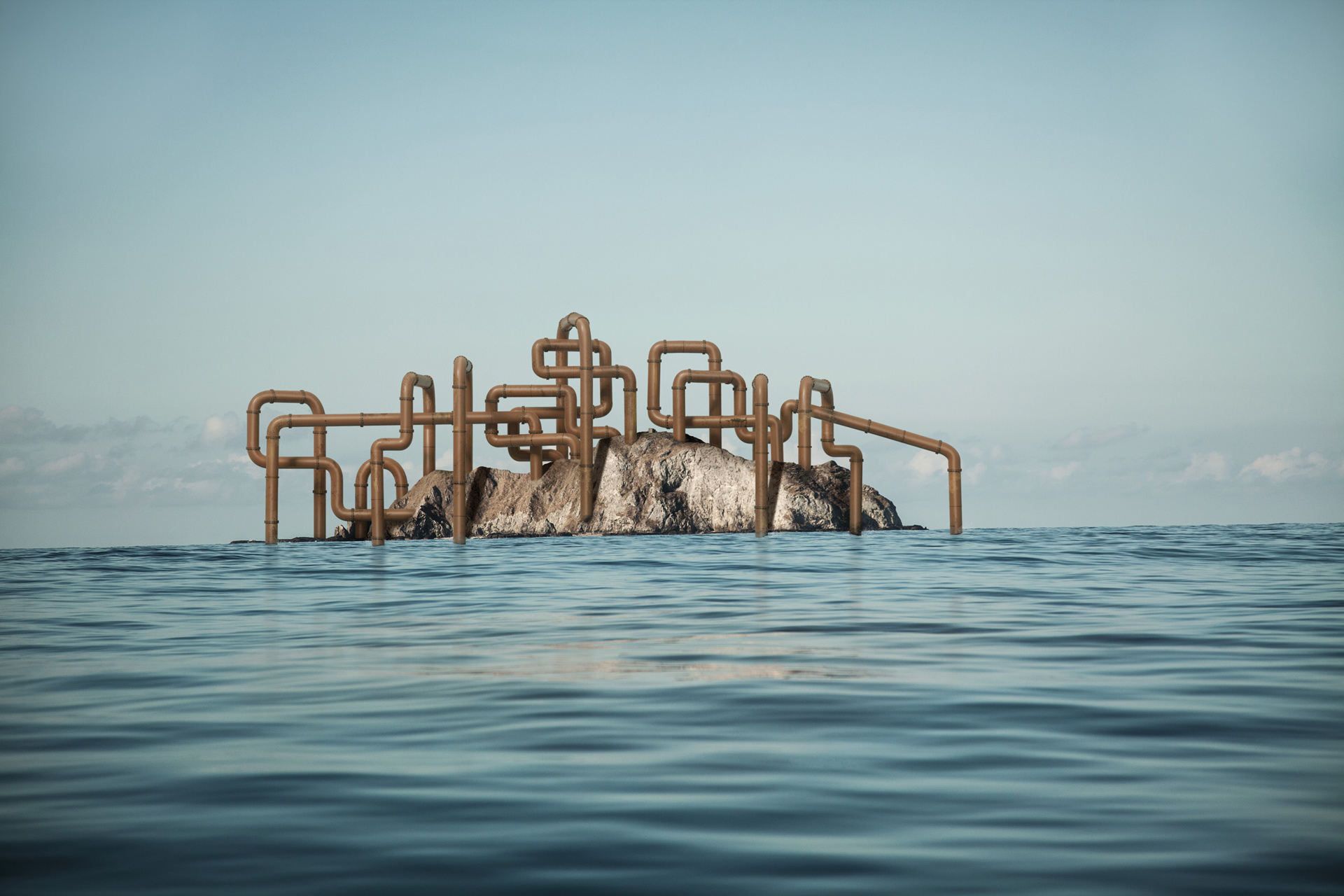 cluster of pipelines going through a rock in middle of the ocean by Simon Duhamel for Pipeline