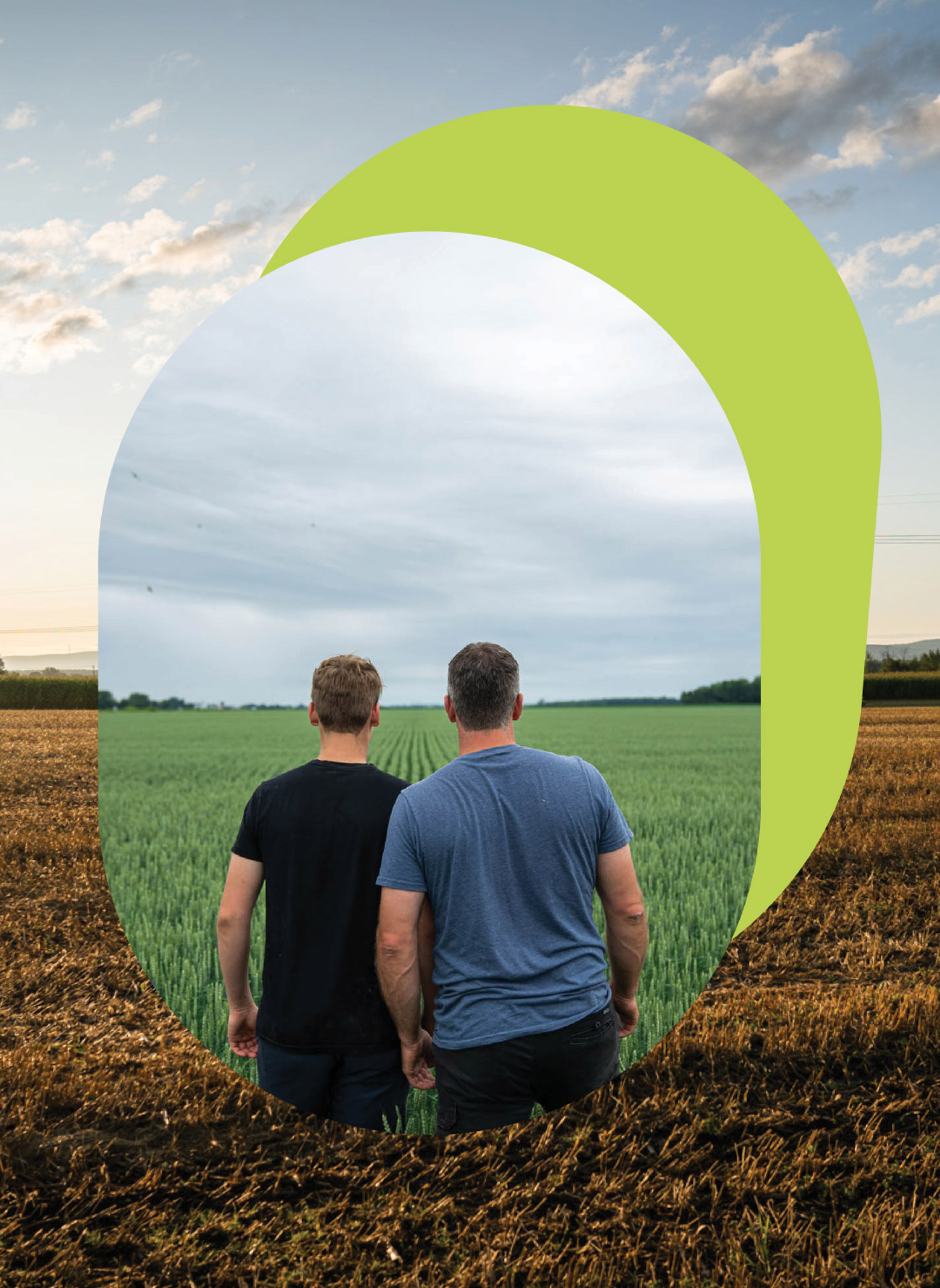 father and son looking out to the fields by Bruno Florin for Sollio Agriculture