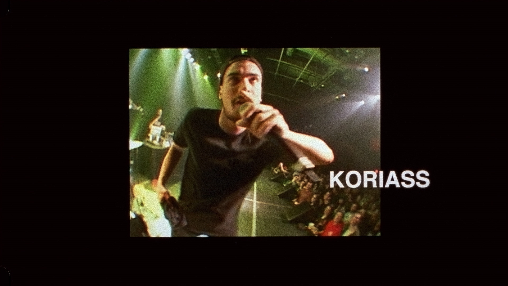 rapper Koriass singing on stage making faces for L'Osstidfilm documentary filmed by Vincent Ruel-Cote from Les Gamins about L'Osstidtour