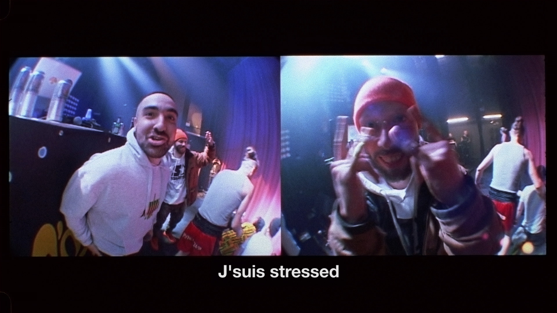 Alaclair Ensemble bandmates being silly in front of camera on stage saying they're stressed for L'Osstidfilm documentary filmed by Vincent Ruel-Cote from Les Gamins about L'Osstidtour