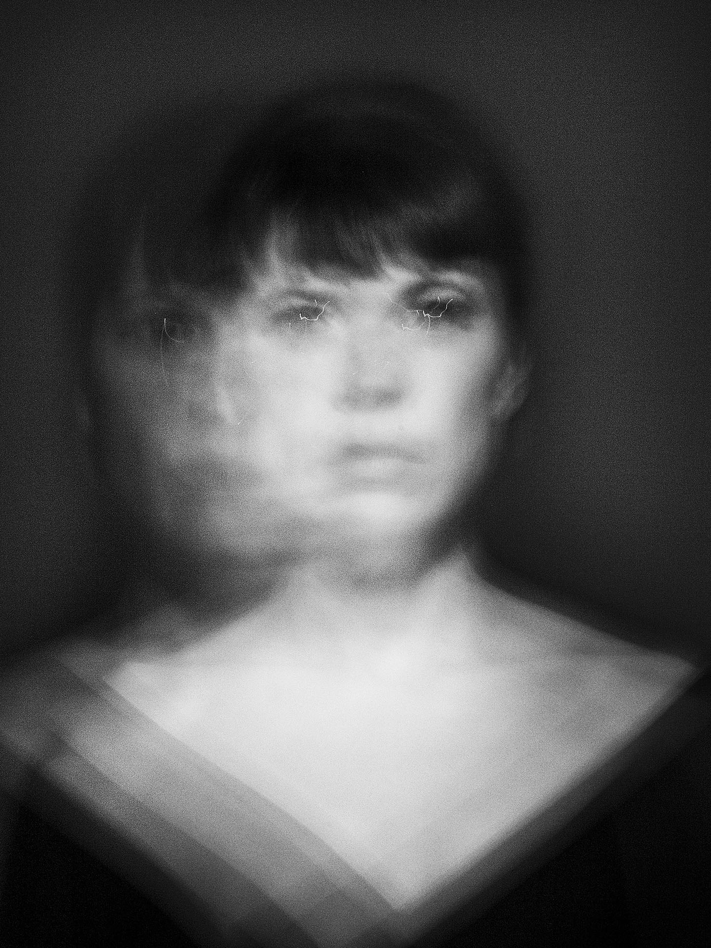 portrait of Anne Dorval in black and white with motion and blurred effect on black background by Jocelyn Michel for Voir