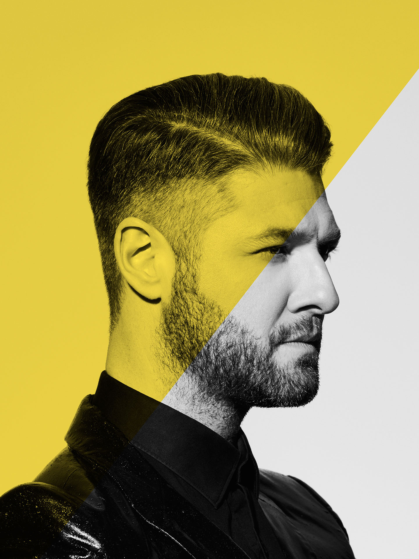 portrait of Pierre Lapointe turn sideway with yellow effect on image by Jocelyn Michel for Voir