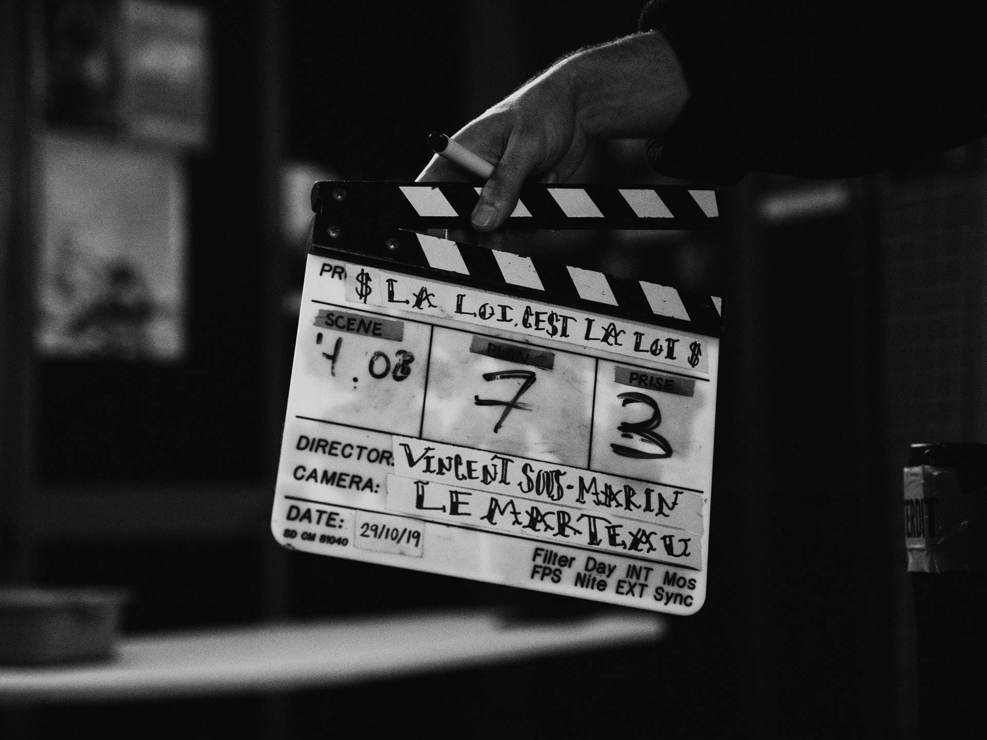 cinema clap with names of Vincent Ruel-Cote and Marco Gilbert from Les Gamins for TV series La Loi C'est La Loi shooting