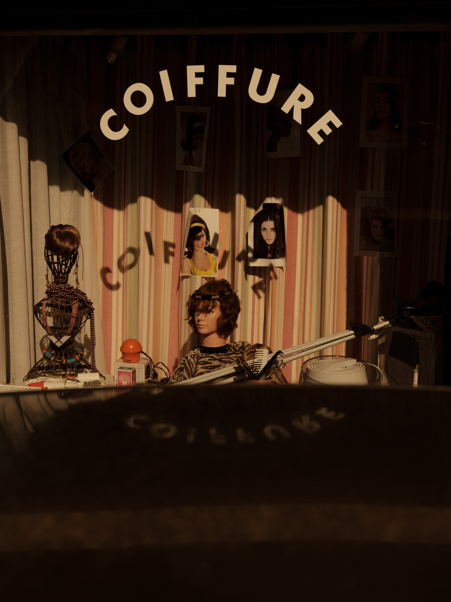 hairdresser shop window by Alexi Hobbs in Auvergne for Reflets de France